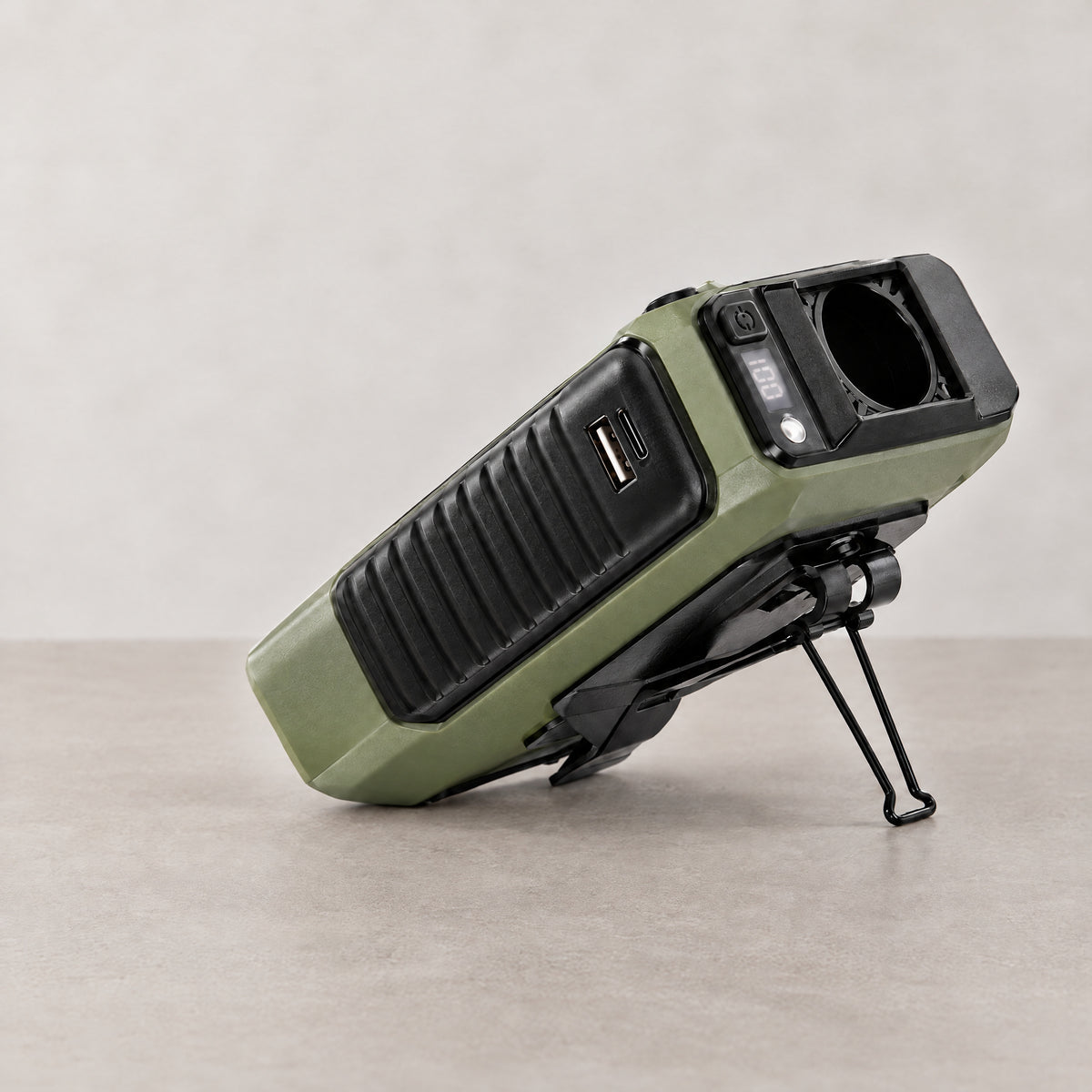 Portable Tactical Fan positioned on its folding stand